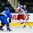 GRAND FORKS, NORTH DAKOTA - APRIL 19: Russia's Vladimir Kuznetzov #20 shoots the puck while Sweden's Jacob Moverare #6 defends during preliminary round action at the 2016 IIHF Ice Hockey U18 World Championship. (Photo by Matt Zambonin/HHOF-IIHF Images)

